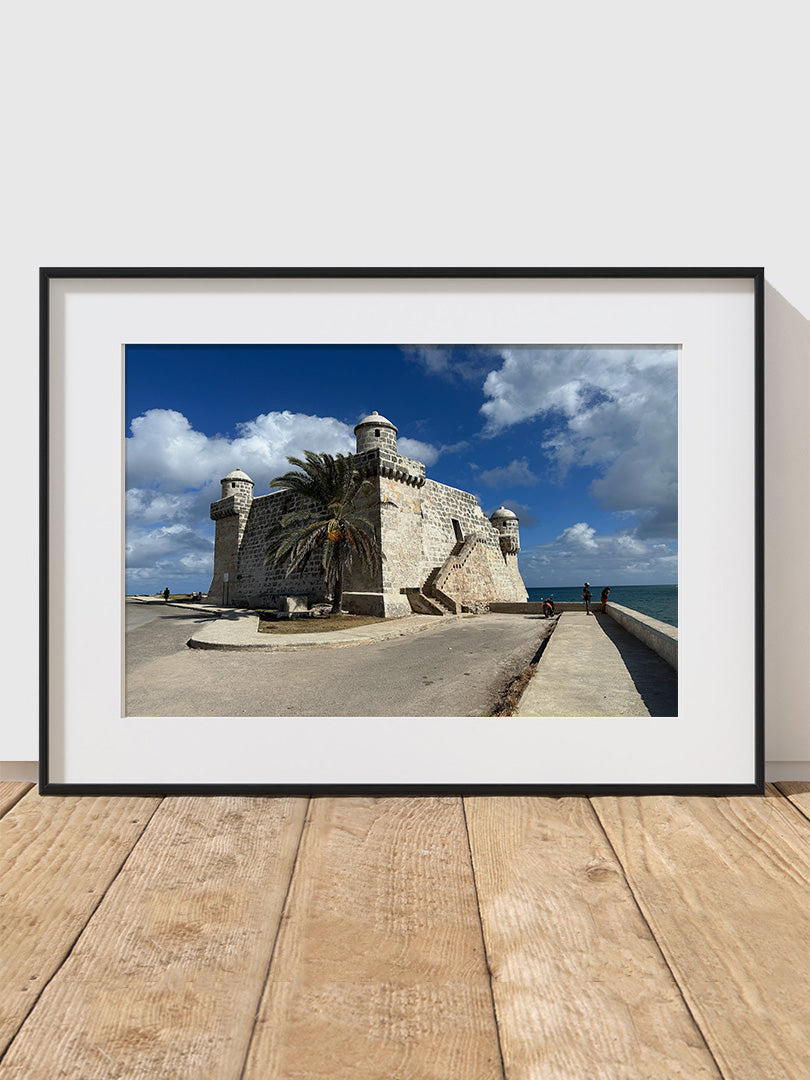 A photograph of a coastal scene featuring the El Morro Fortress in Havana, Cuba